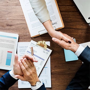 Business dealing taking place from above