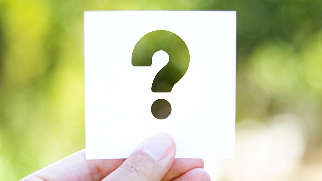 Hand holding question mark