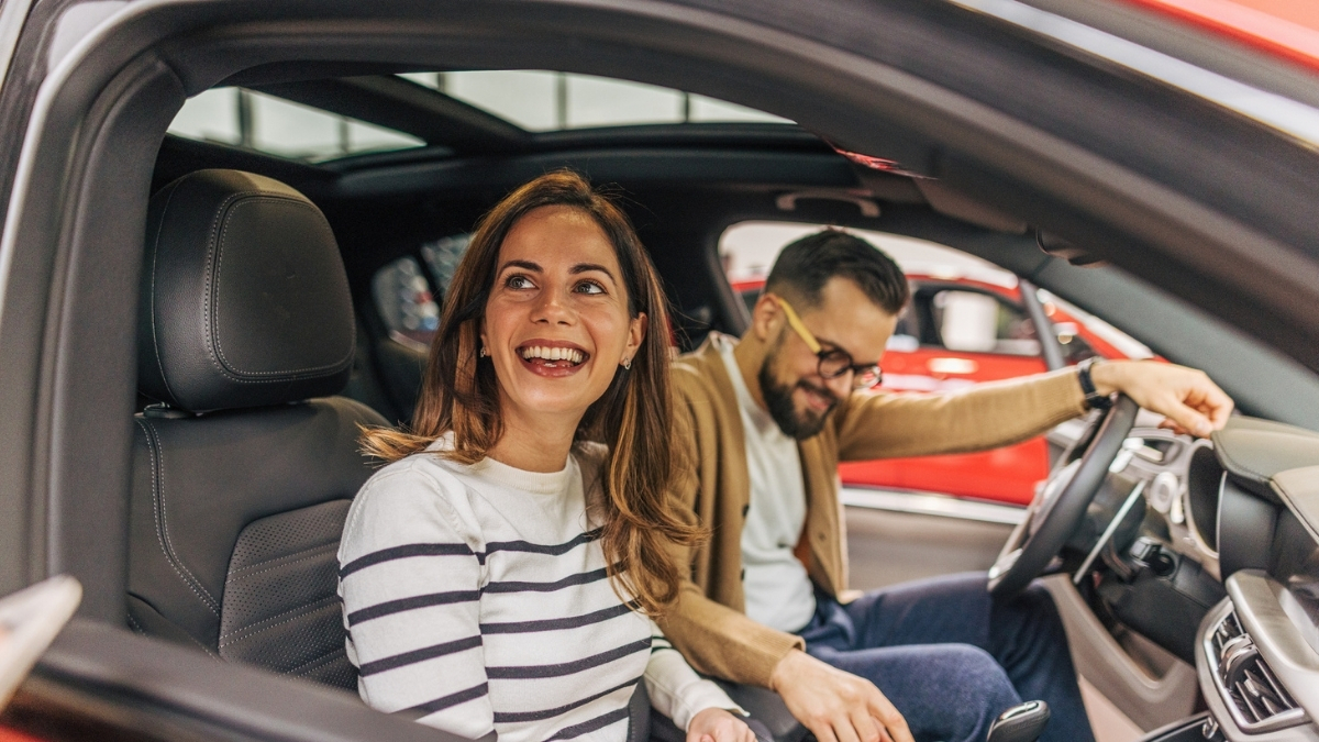 Couple buying new car 