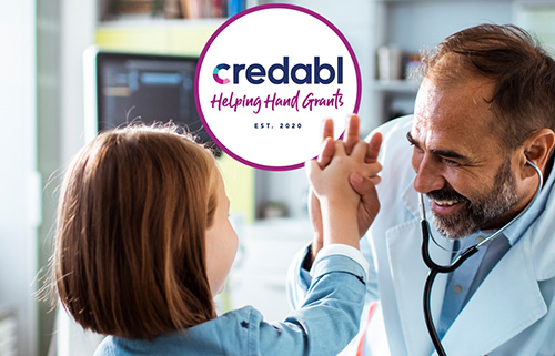 Doctor helping child patient