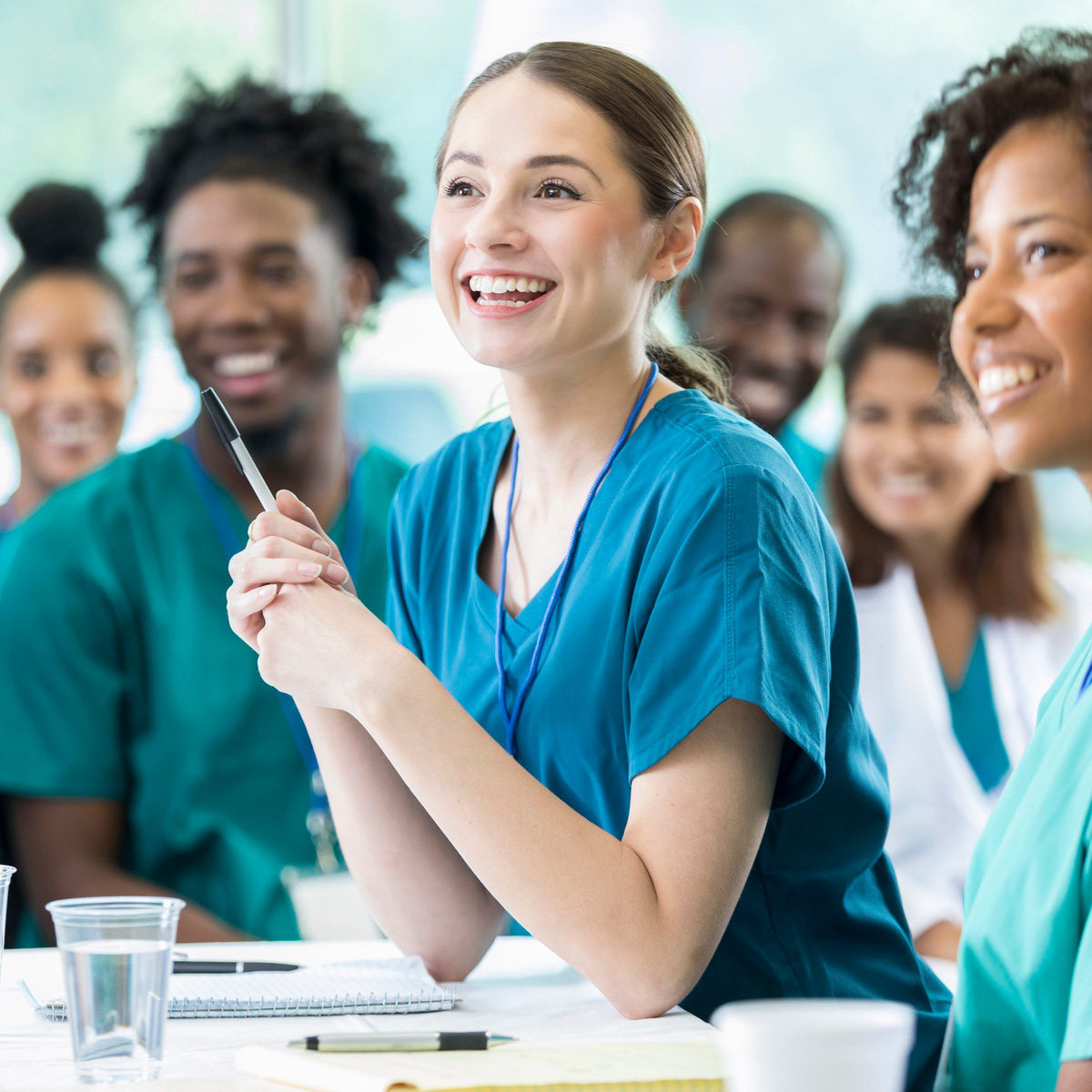 Junior doctor answering question in class