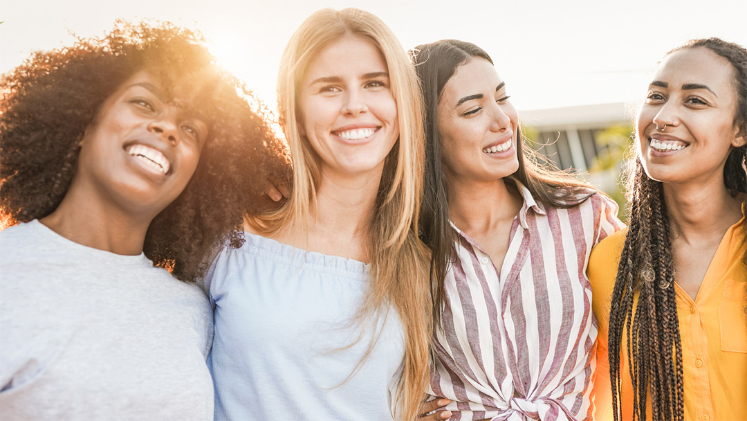 Women enjoying the sunset together